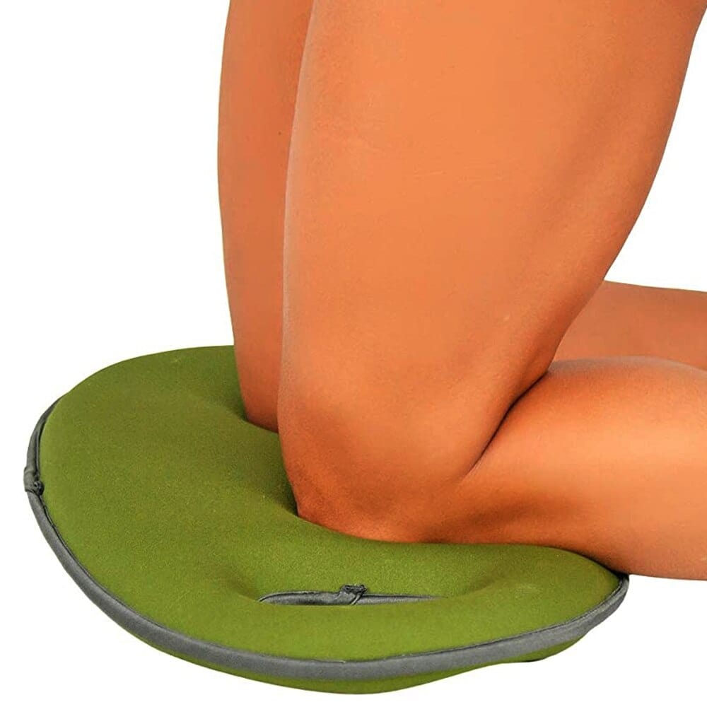 An individual using the heavy-duty EVA kneeling pad inside a bathroom to comfortably support their knees.