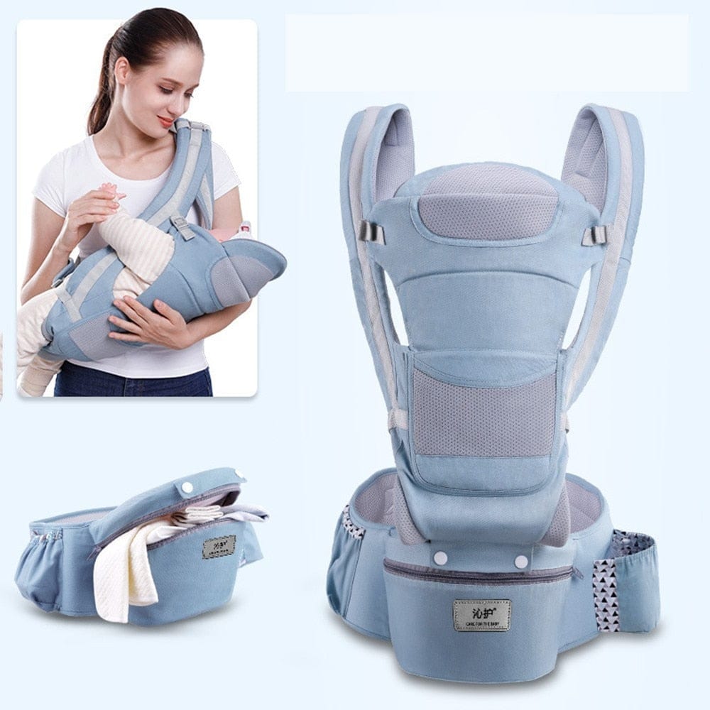A view of the light green Ergonomic Baby Carrier showcasing its wide padded waistband and sturdy shoulder strap connectors.