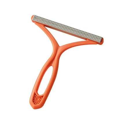 Orange Lint Roller for Pet Hair showing its detachable brush head and easy-peel adhesive sheet structure.