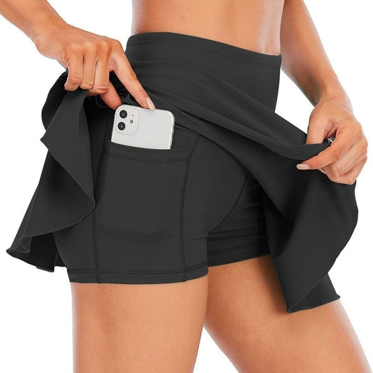 Black Tennis Skorts with Pockets displaying a phone tucked securely into the integrated under-short pocket.