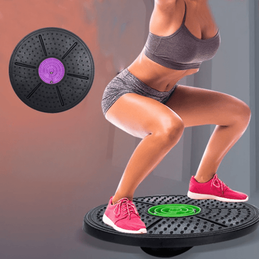 Side view of an athlete executing a deep squat on the ABS twisting balance board.