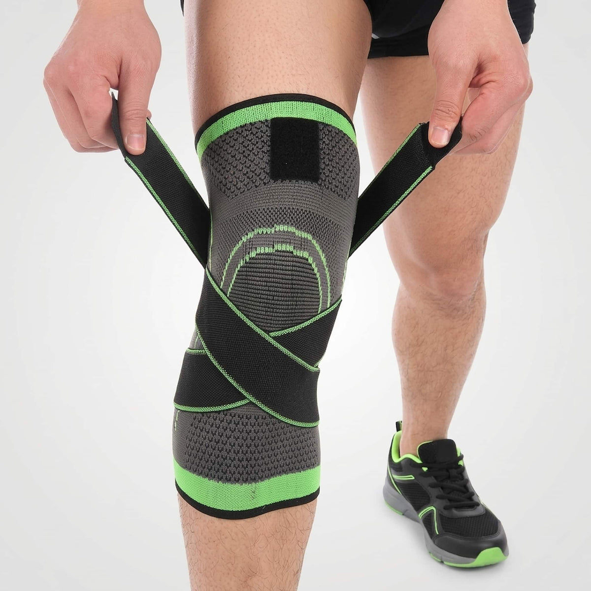 adjustable cross-strap knee stabilizer