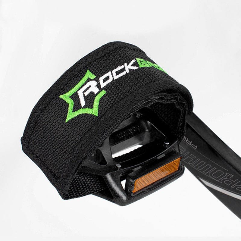 Close-up macro view highlighting the double-stitched edge construction of an adjustable pedal strap pair.