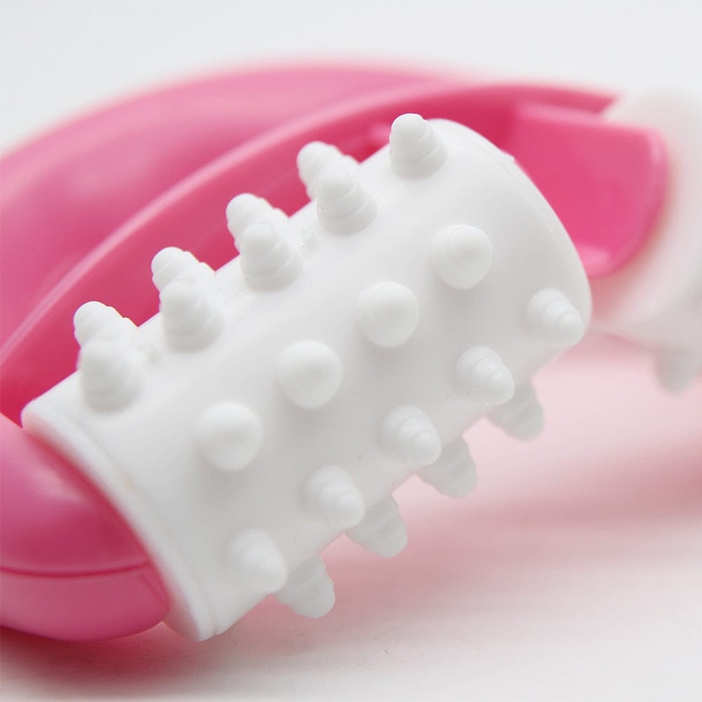 Close-up of the pink anti-cellulite body roller highlighting the smooth rotation alignment of the massage spheres.