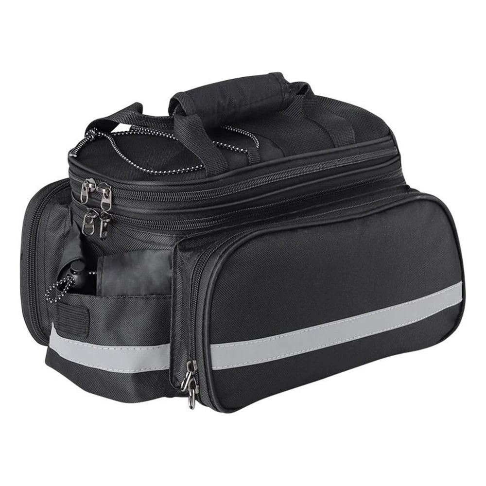 A black bicycle pannier bag with a reflective silver stripe on the front, shown on a plain white background.