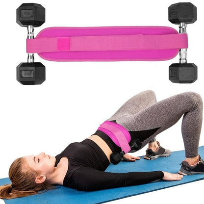 an athlete using a dumbbell hip thrust strap