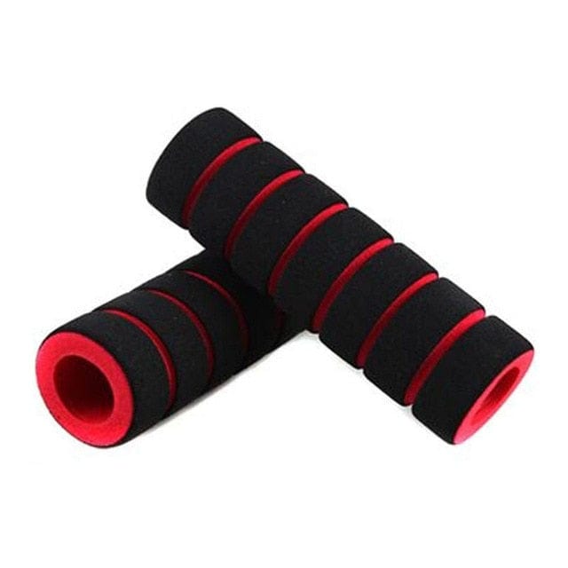 Close-up view of the red and black ergonomic bicycle grip showing the slide-on inner core.