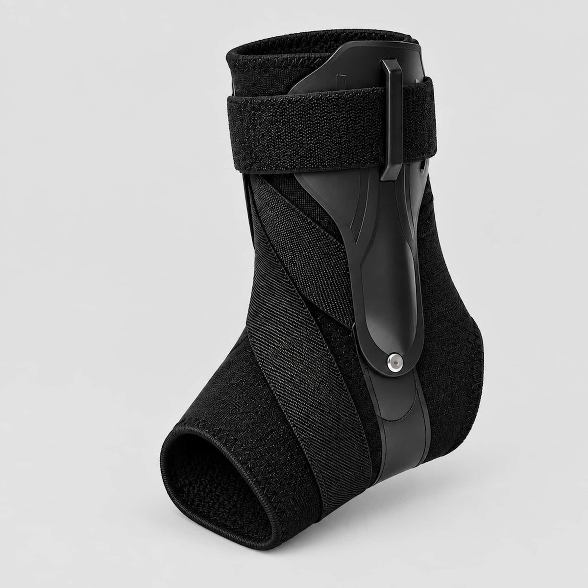 A high impact workout ankle stabilization strap with adjustable hook-and-loop straps and a molded plastic support piece, shown on a light gray studio background.