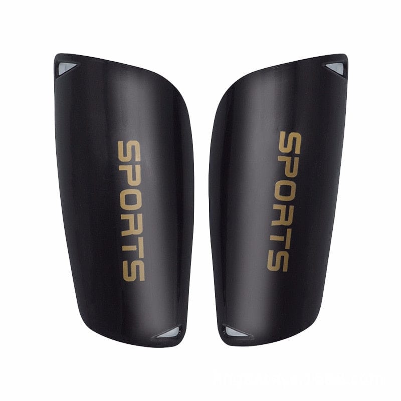 Detailed view of the thick high-impact ABS outer shell on a black junior athletic guard.