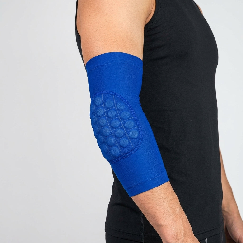 A blue kids elbow pads for basketball with a textured bubble pad on the forearm, shown worn on a person's arm against a light gray background.