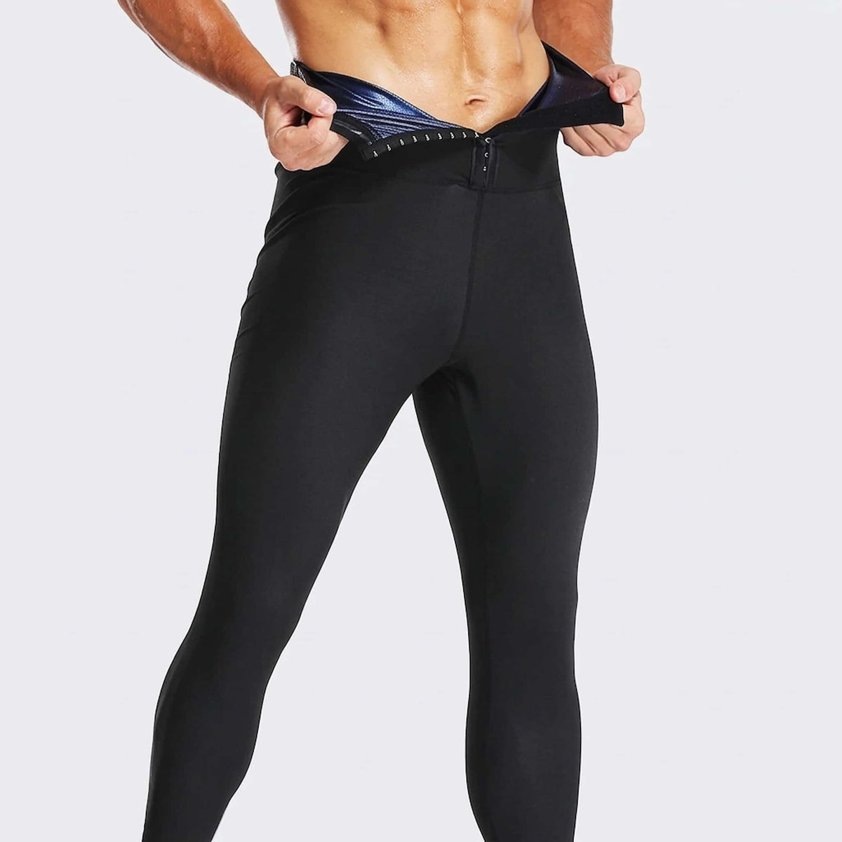 men heat retaining workout pants worn by a person on a white background