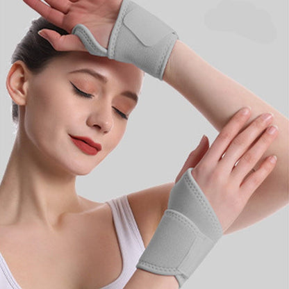 Profile of a gray neoprene wrist wrap highlighting the unobstructed thumb movement boundary.