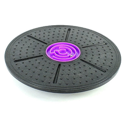 Close-up detail of the durable plastic center pivot dome on a comprehensive fitness exercise disc.