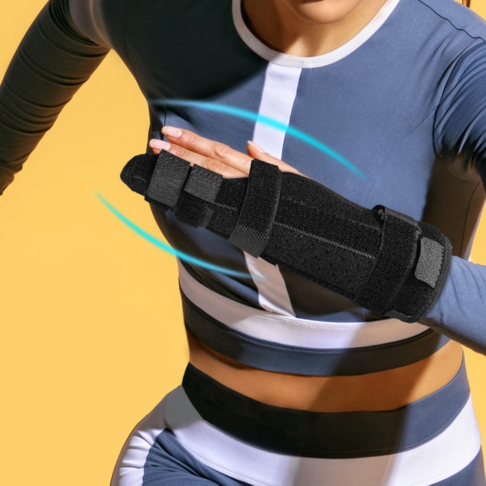 An active individual comfortably wearing the low-profile ring finger splint underneath a standard winter glove.