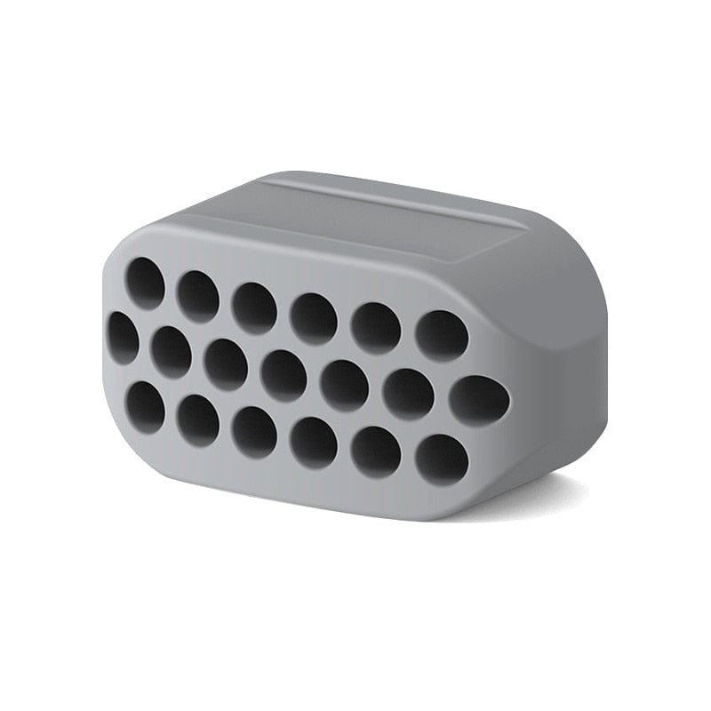 Front view of the gray silicone jaw exerciser block highlighting its compact 10g profile.