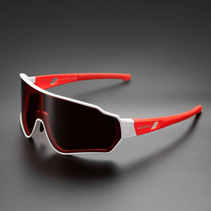 Side profile of transition sunglasses for cycling showing the flexible, aerodynamic temple arms and rubber grips.
