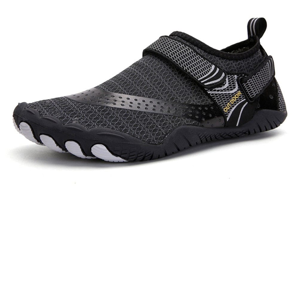 black unisex rain shoes on a white background