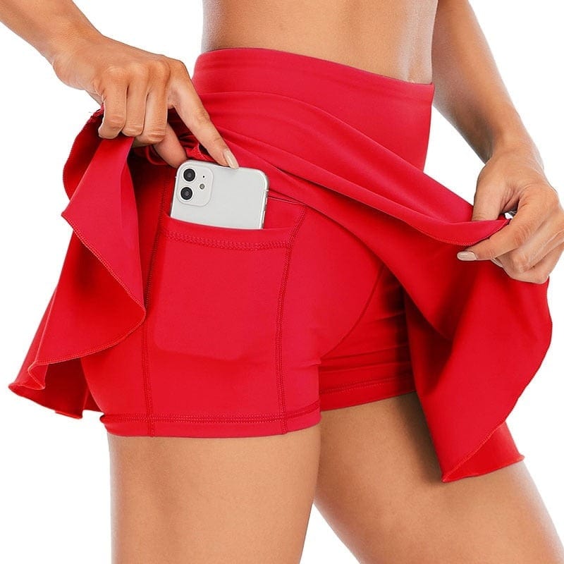 Close-up of the lightweight, breathable polyester fabric texture on a women's golf skort