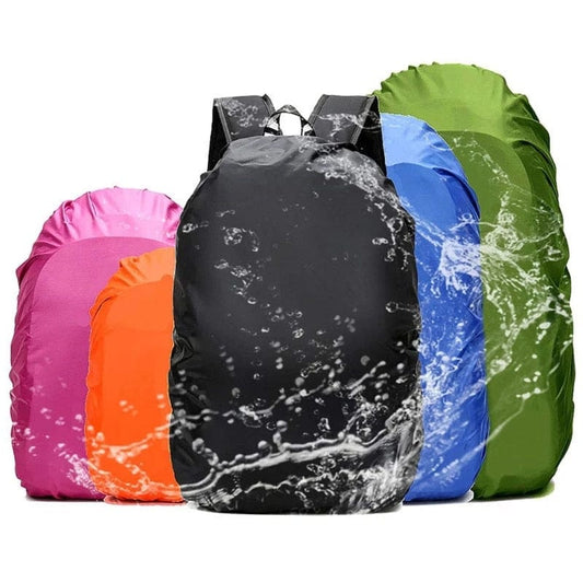 A collection of backpacks with rain covers in various colors displayed with a splash of water on them, indicating the waterproof feature of the covers.