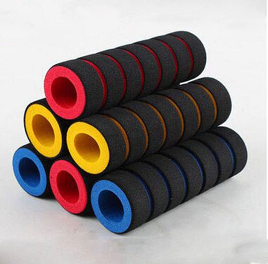 Bulk layout of black and multi-colored Bicycle Handlebar Grips showcasing their thick sponge texture.