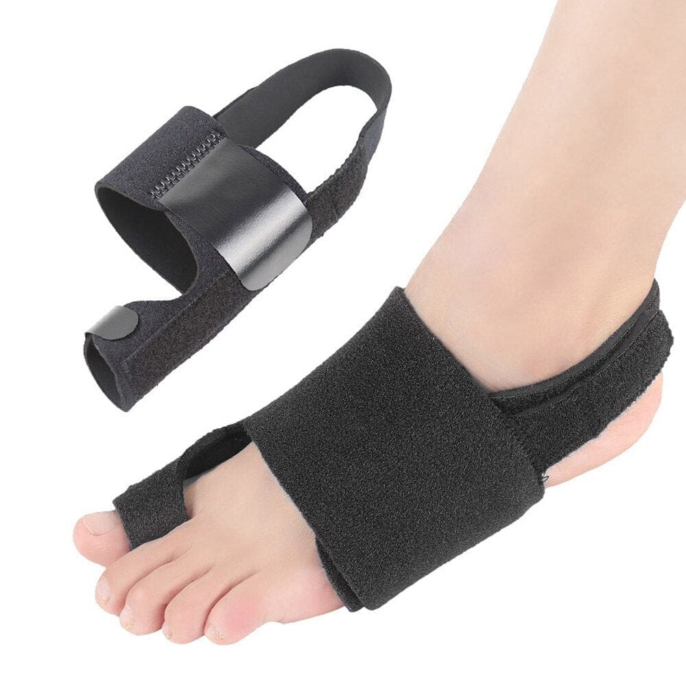 Black Big Toe Splint showing its secure wrap-around strap design on an adult's left foot.