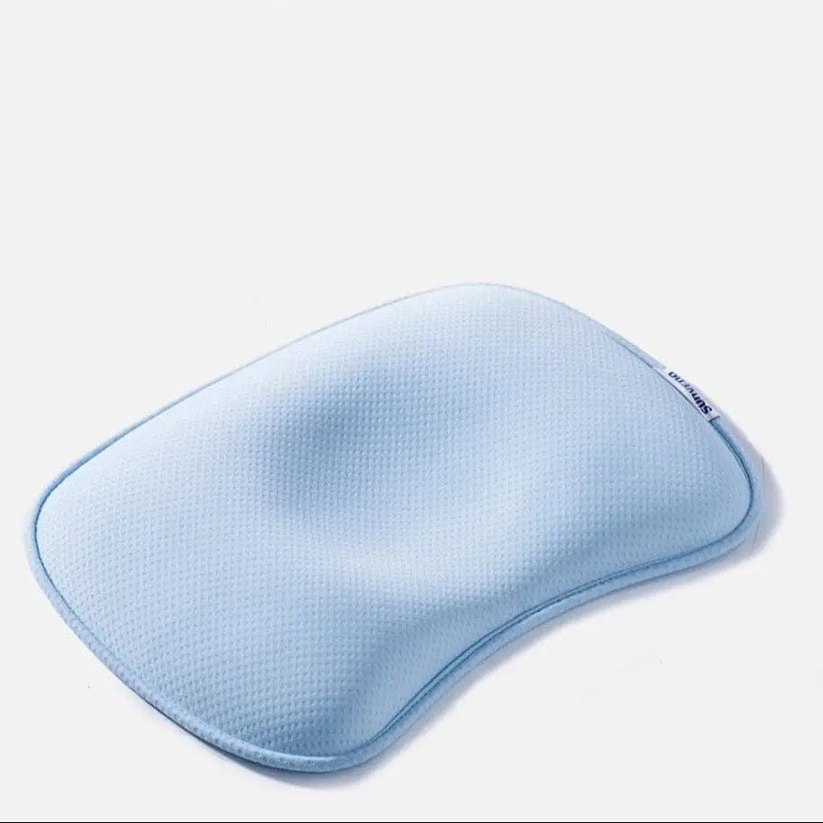 White Sunveno baby pillows displaying their ergonomic orthopedic profiles.