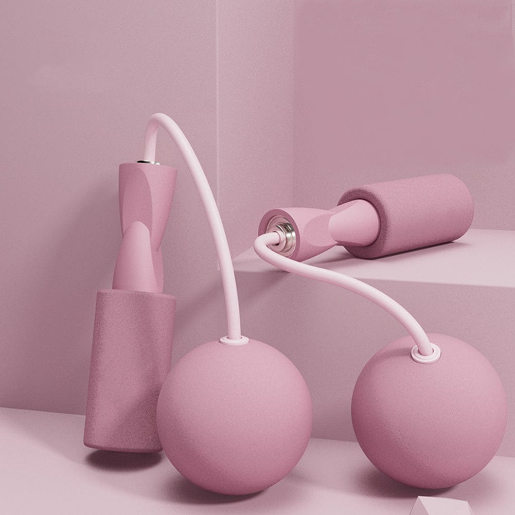 Pink cordless jump ropes with weighted ball attachments and EVA foam handles.